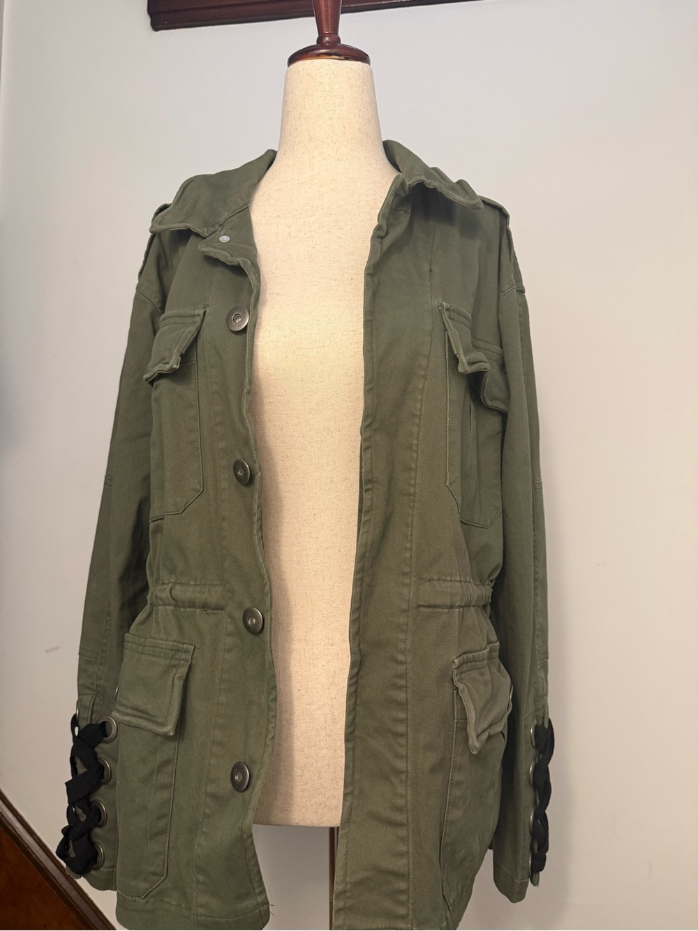 Olivaceous Olive Green Utility Jacket with Lace-Up Cuffs and Back